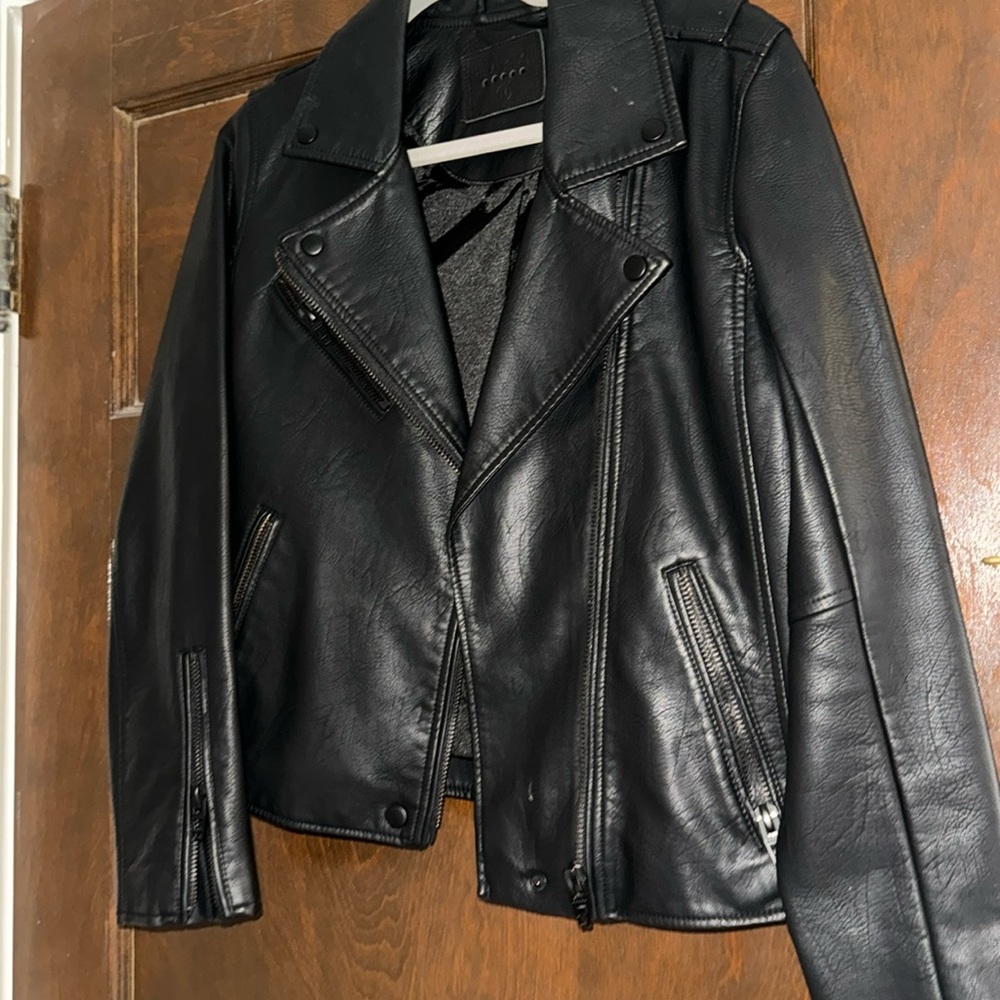Black leather jacket with black hardware